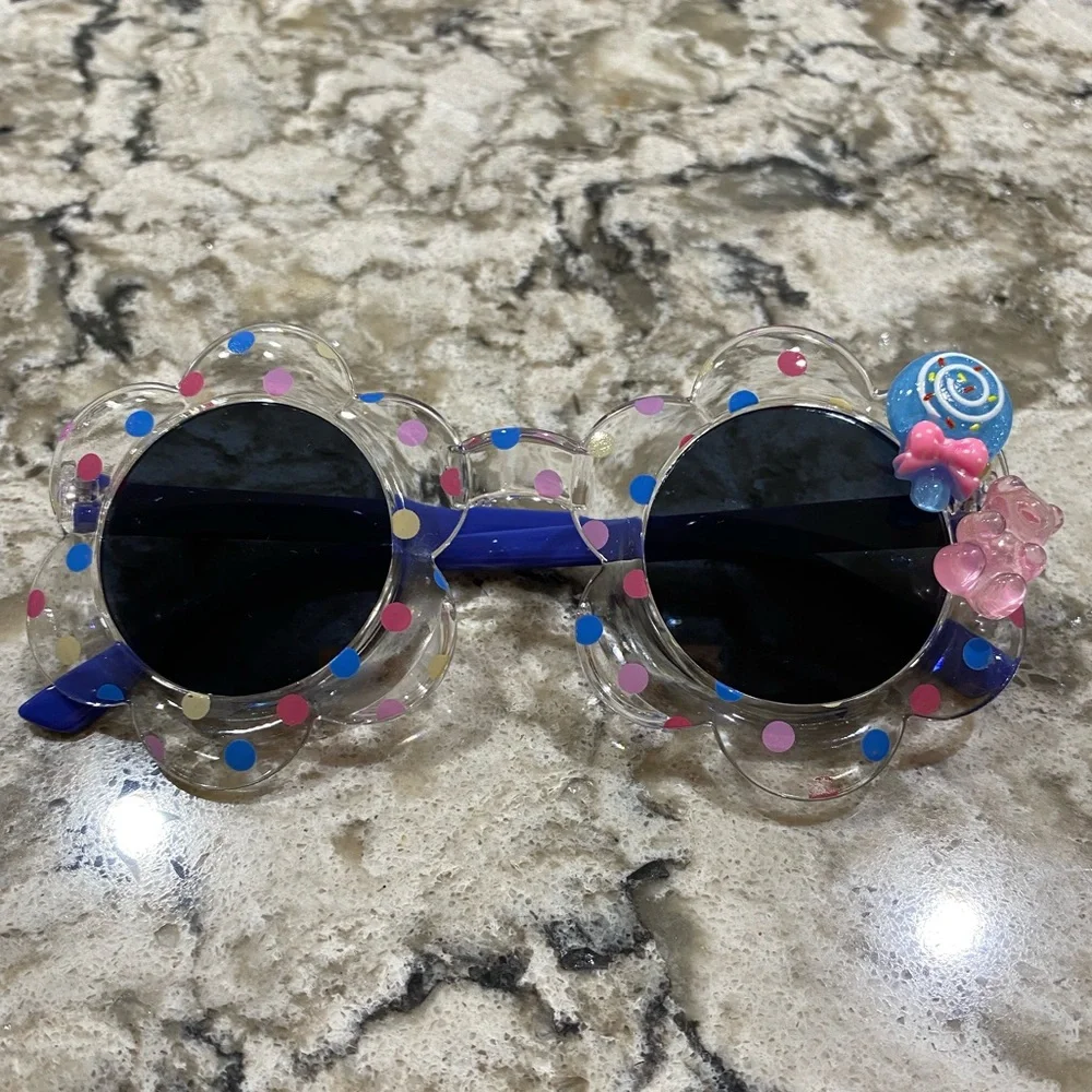 Girls flower shaped blue multi colored dot sunglasses